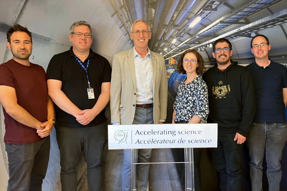 UVic researchers and former president Kevin Hall at CERN