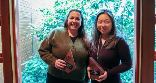 Kimberley and Monica posed with their awards