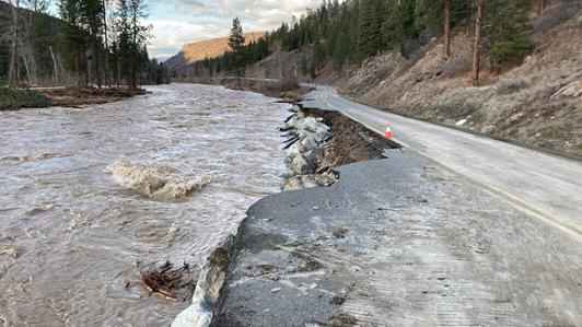 A broken up portion of highway due to flooding in southwestern BC November 2021.