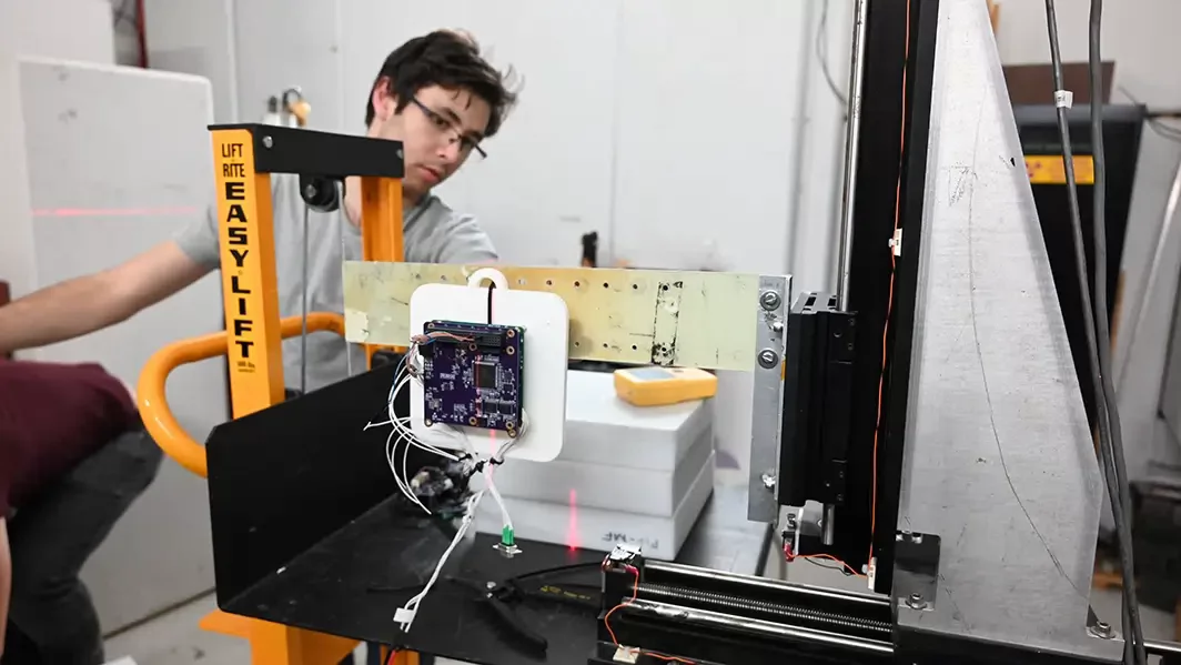 Testing radiation tolerance of satellite components.