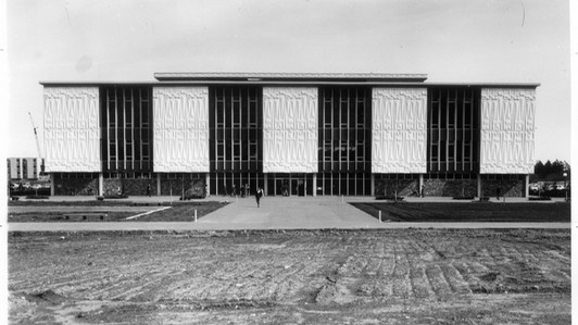 A black and white photo of the UVic McPherson building