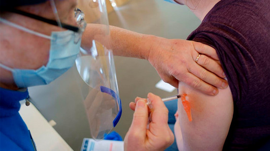 patient receiving vaccine