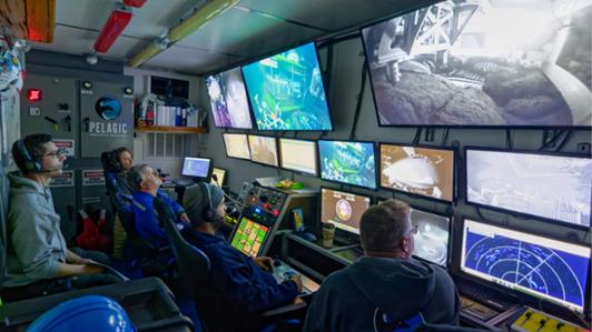 Photo of the inside of the control room of Canadian Coast Guard vessel, John P. Tully, with the Ocean Networks Canada and Pelagic Research Services team to conduct around-the-clock operations to maintain and expand ONC infrastructure in the northeast Pacific Ocean