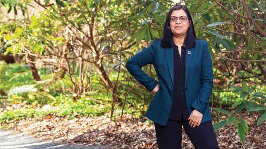Profile photo of Dr. Basma Majerbi in a forested area on campus