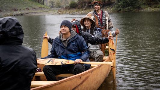 Paddlers load into the Cupuc (canoe) for its first launch into the Gordon River. At rear, Makah Master Carver, Micah McCarty, and in front of him, PFN Apprentice Carver, Trystan Dunn-Jones.