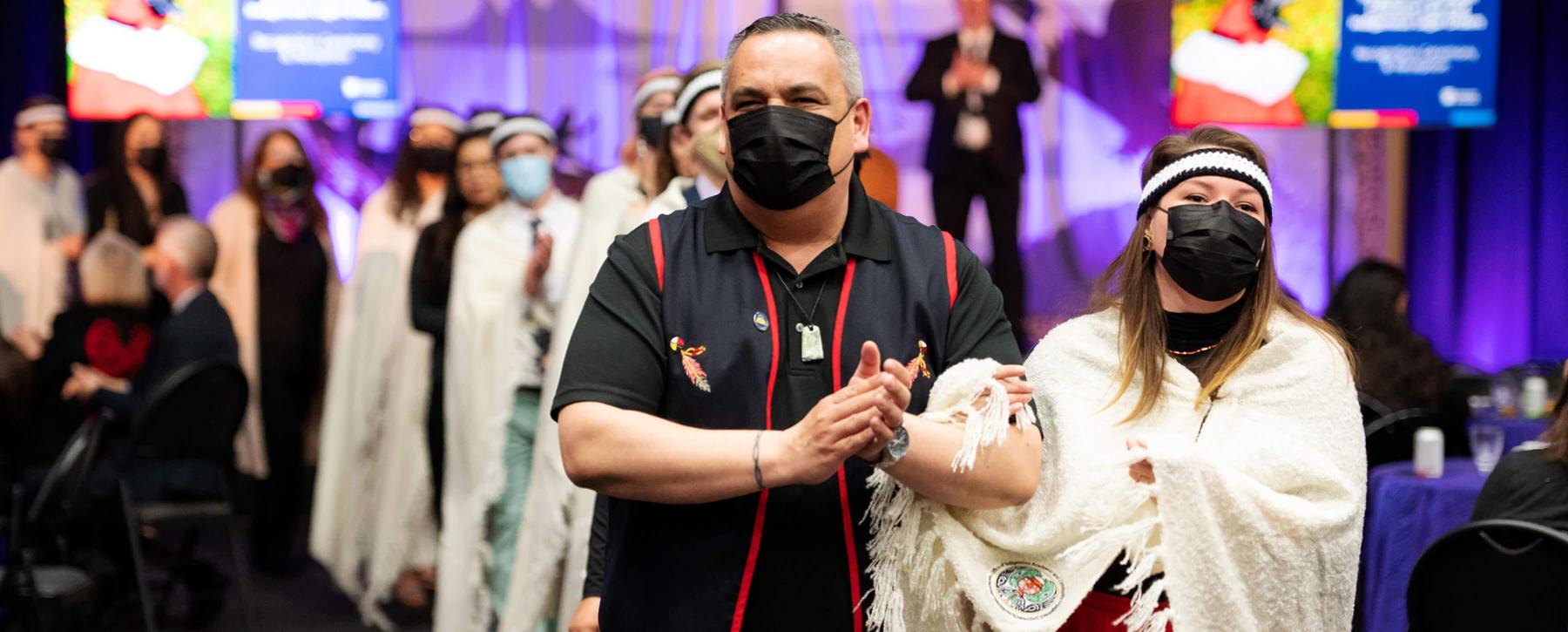 Jolene Ashini from the Sheshatshiu Innu First Nation alongside Sheshatshiu Innu First Nation Chief Eugene Hart