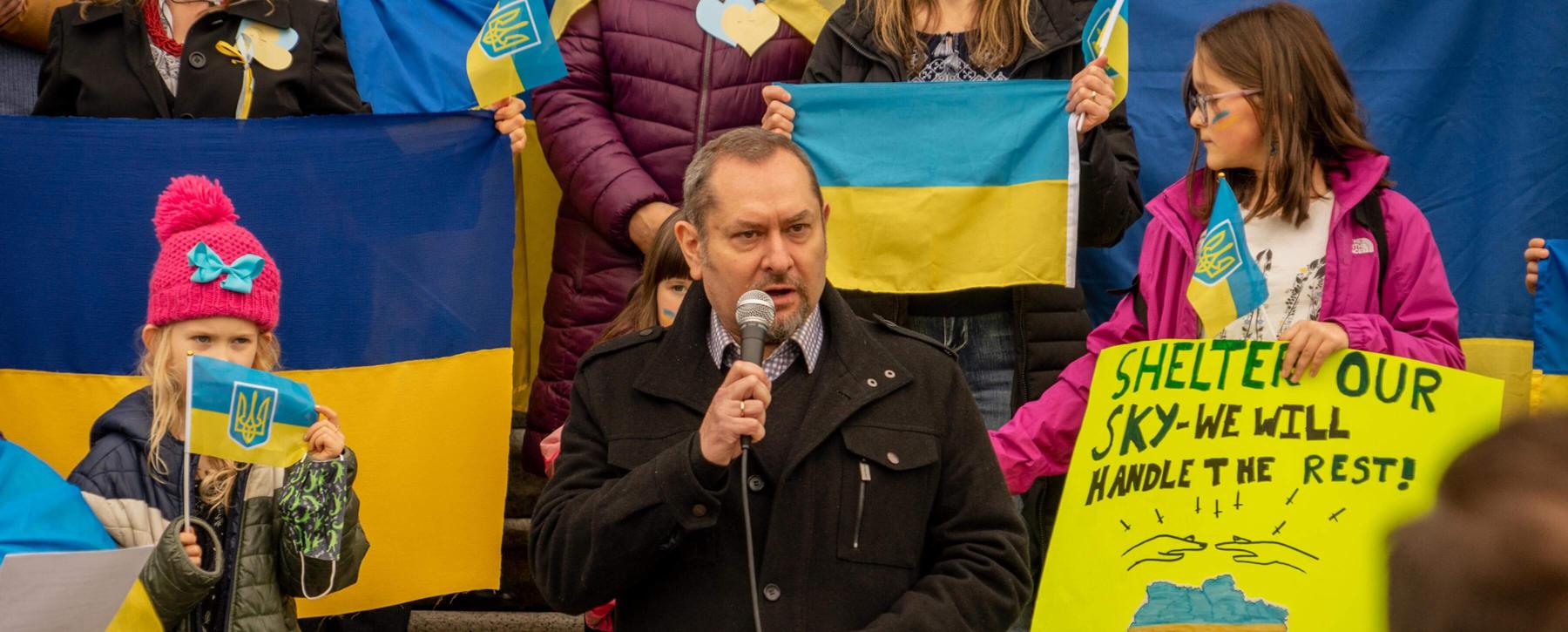 Serhy Yekelchyk speaks at a rally at the BC legislature in Feb. 2022.