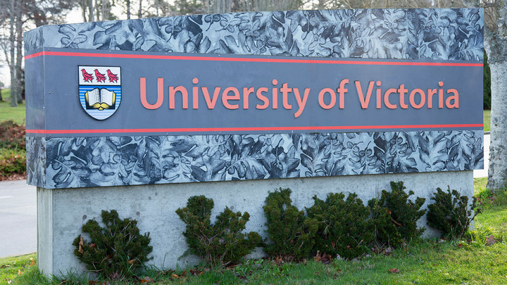 Close-up image of the UVic sign and crest.