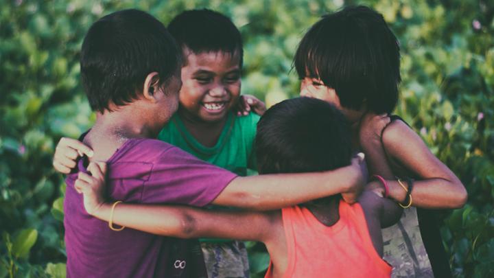 group of children hugging