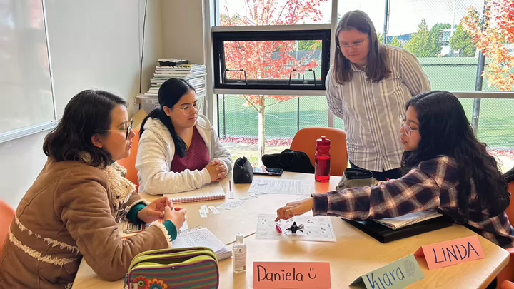 A group of international students in a DCS classroom
