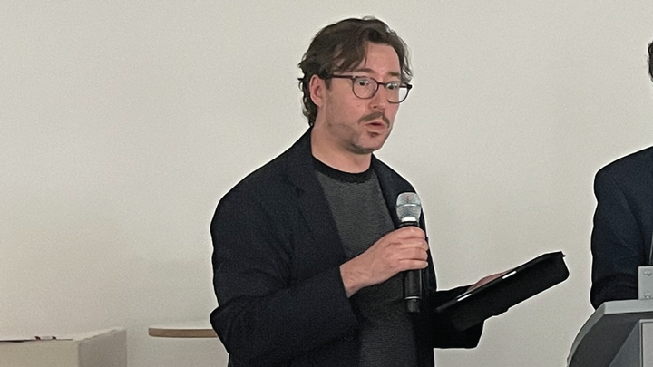 Dr. Nathaniel Brunt at a conference in Berlin