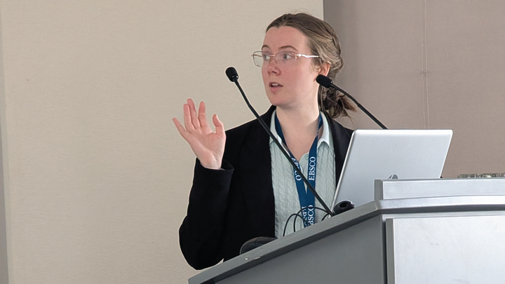 Dr. Chloe Farr at a conference in Berlin