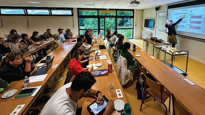 Photo of a group of Environmental Studies taking classes in a UVic classroom