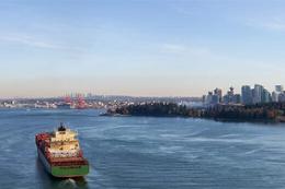 A freighter in downtown vancouver harbour.