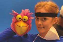 Female puppeteer and puppet 