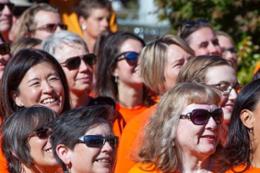 a group of individuals at an orange shirt day event