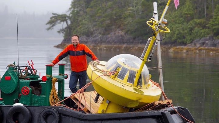 Brad Buckham on boat with buoy