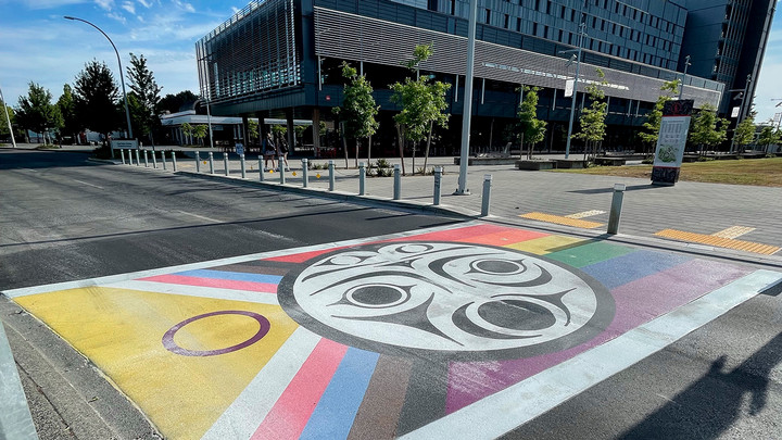 UVic pride crosswalk in front of Cheko'nien House