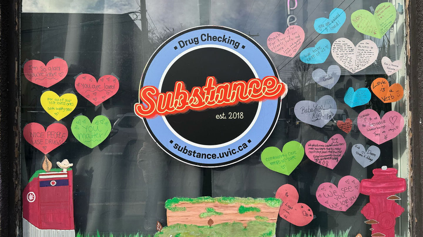 The window of substance featuring their logo and hearts with messages of support to the community