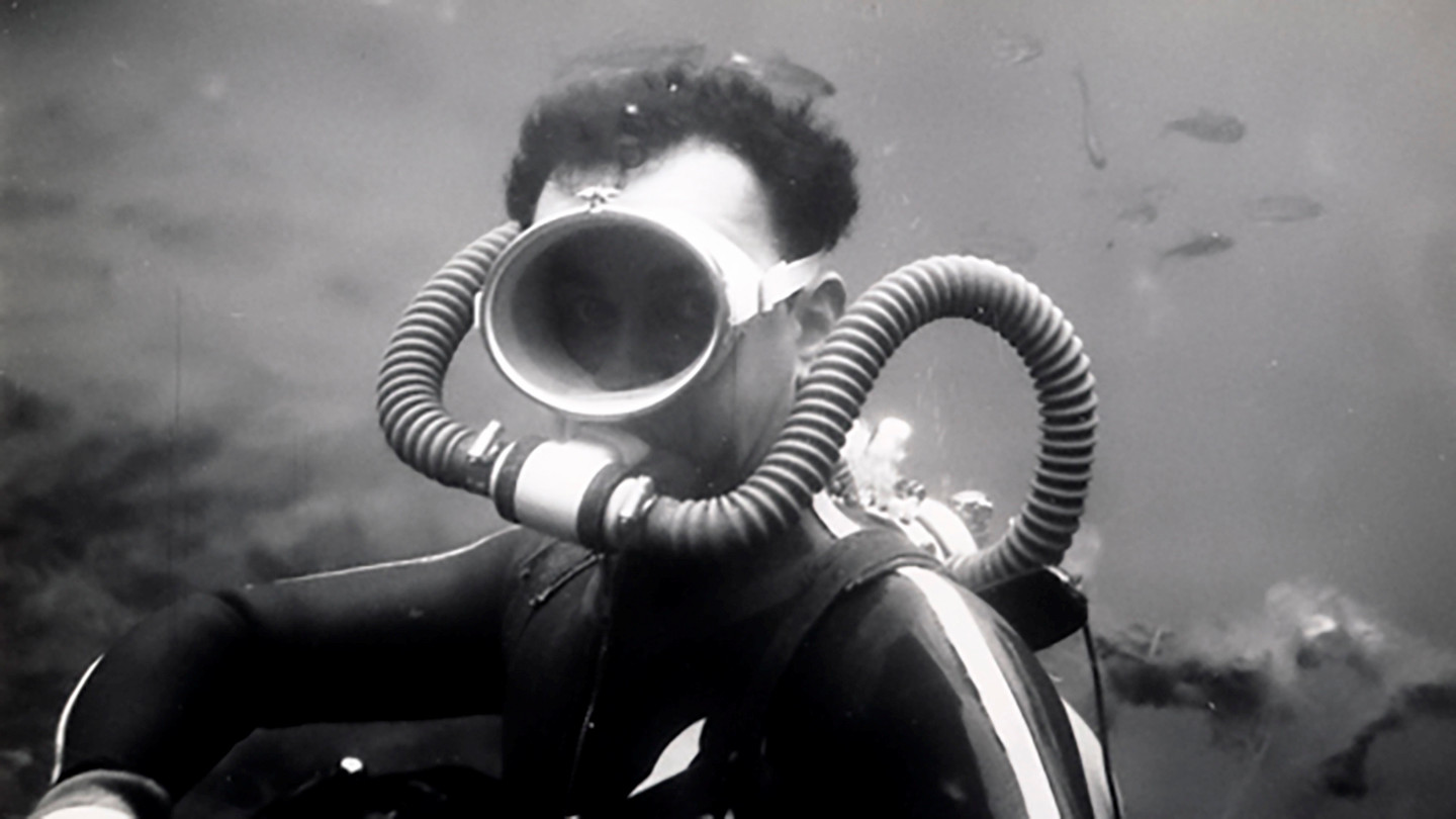 Derek Ellis underwater wearing SCUBA gear