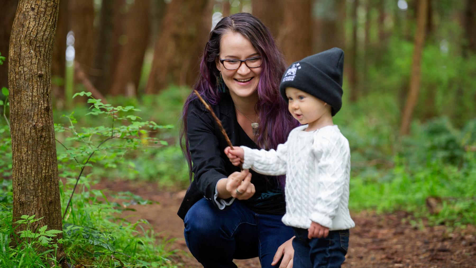 Keisha Everson with son in forest