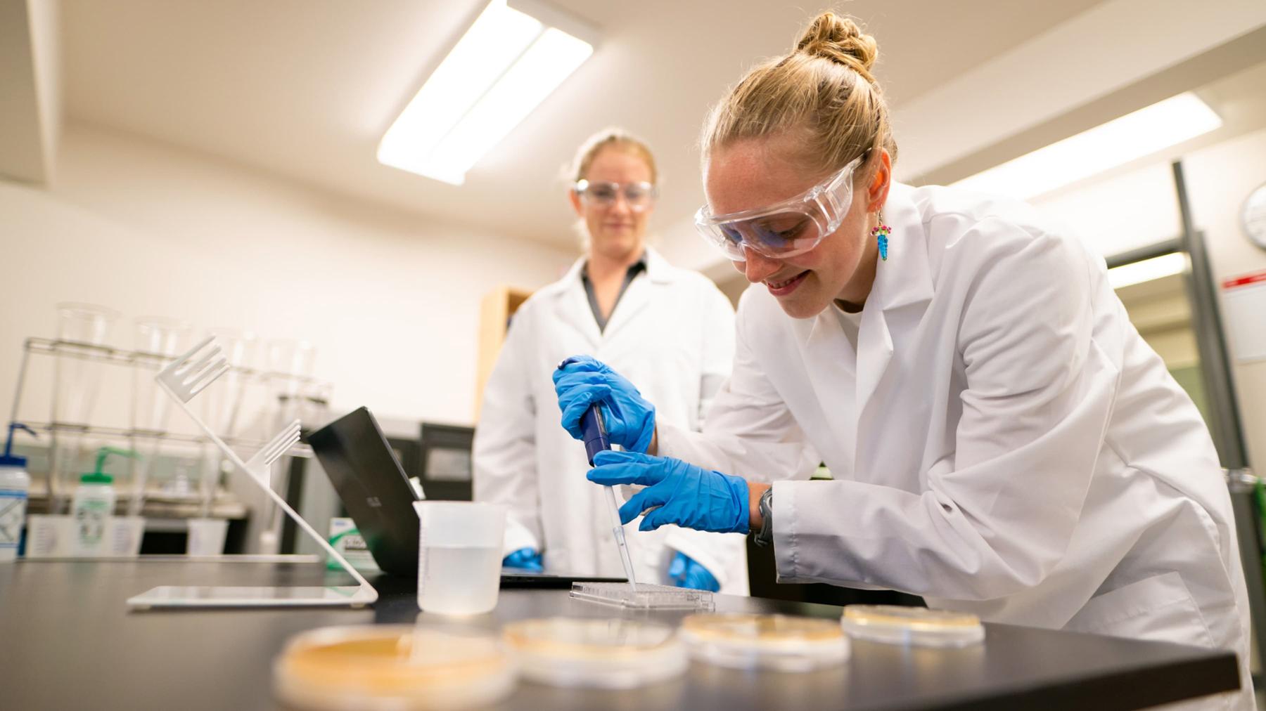 two researchers in lab