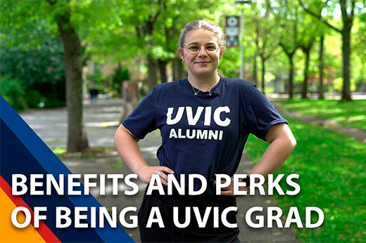 Woman wearing UVic Alumni T-shirt with trees in the back ground and the words Benefits and Perks of Being a UVic Grad..