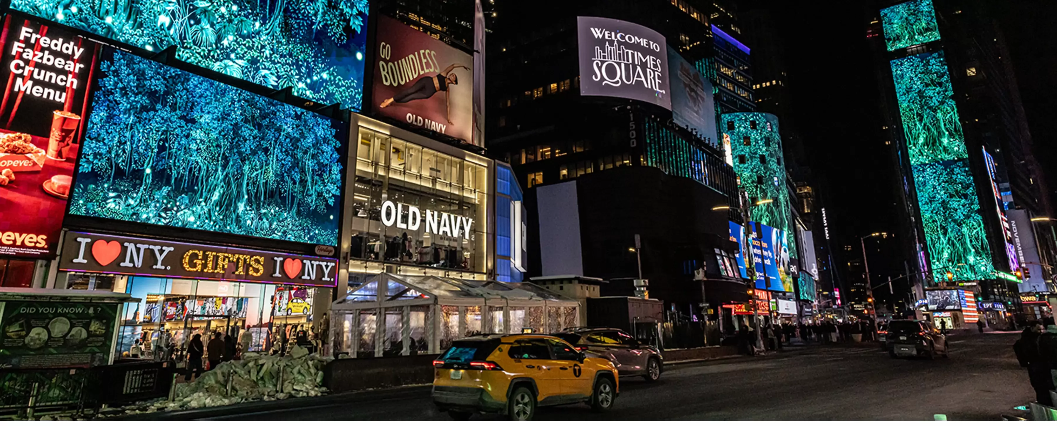 A digital image of a tree on a digital billboard in New York City's Times Square.