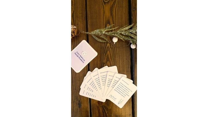 Cards on a wood table. 