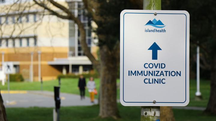 Sign for COVID immunization clinic