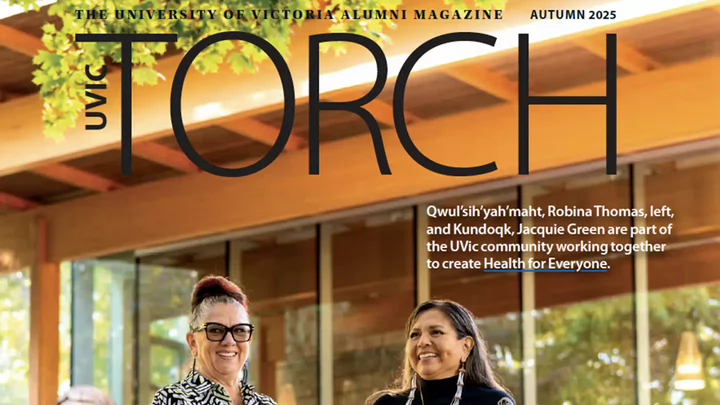 Two women smiling on the cover of a magazine titled Torch Alumni Magazine.
