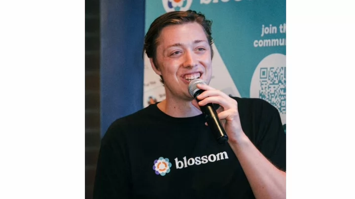 A man speaking into a microphone.