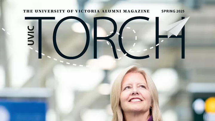 Magazine cover titled Torch UVic Alumni Magazine featuring photo of a woman smiling and looking upward in an airport.