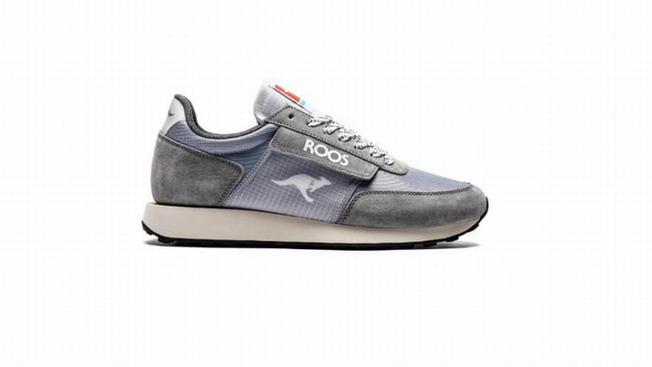 A shoe with the logo of a kangaroo and the word Roos on it.