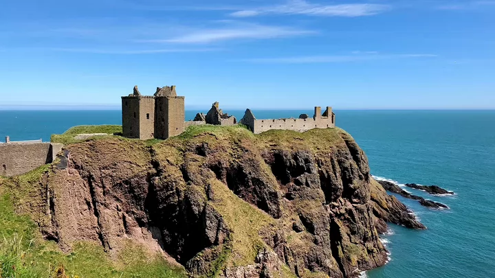 A castle overlooking the ocean.