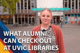 Women wearing glasses in front of a library.