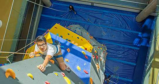 Student climbing the tower