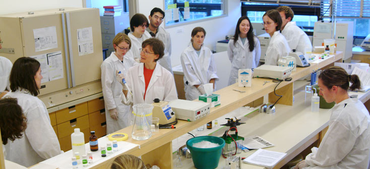 Science lab instructor with students