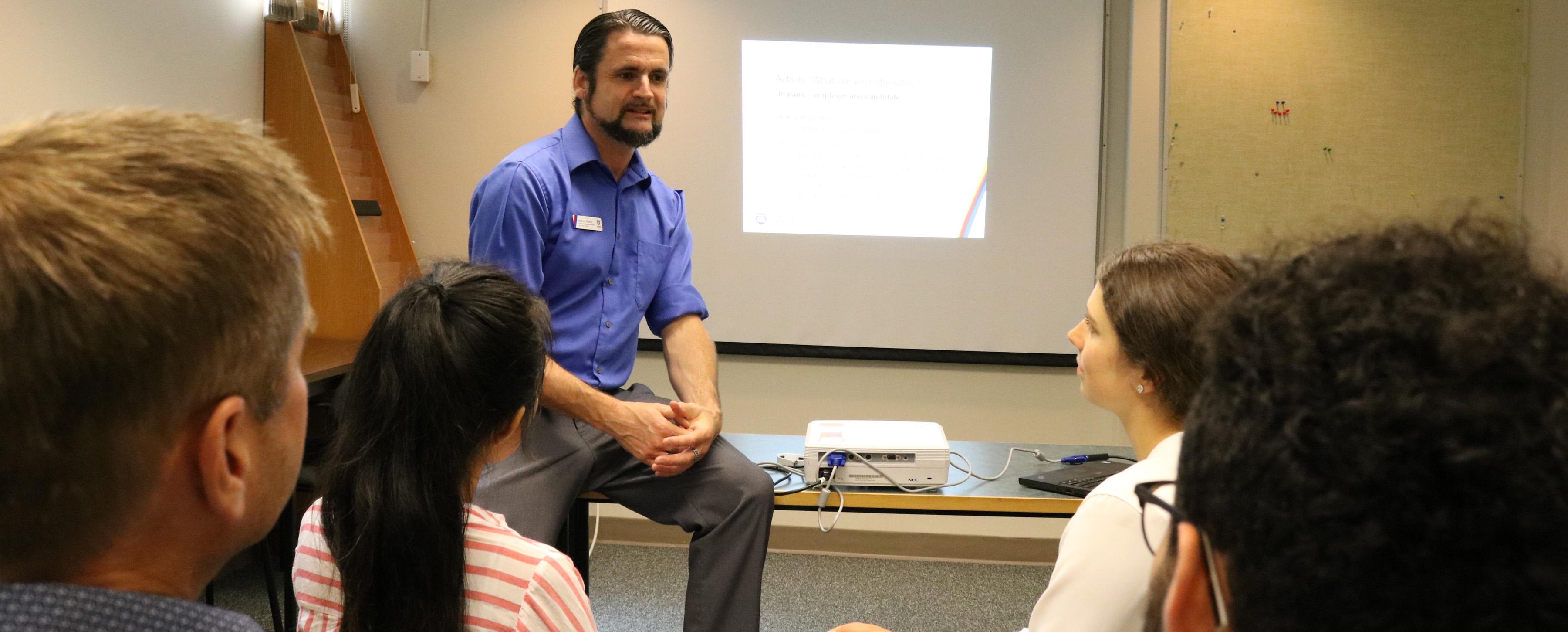 career educator leading a workshop