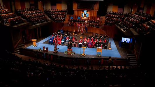 Convocation stage with all furnishings and with seated dignitaries in full regalia