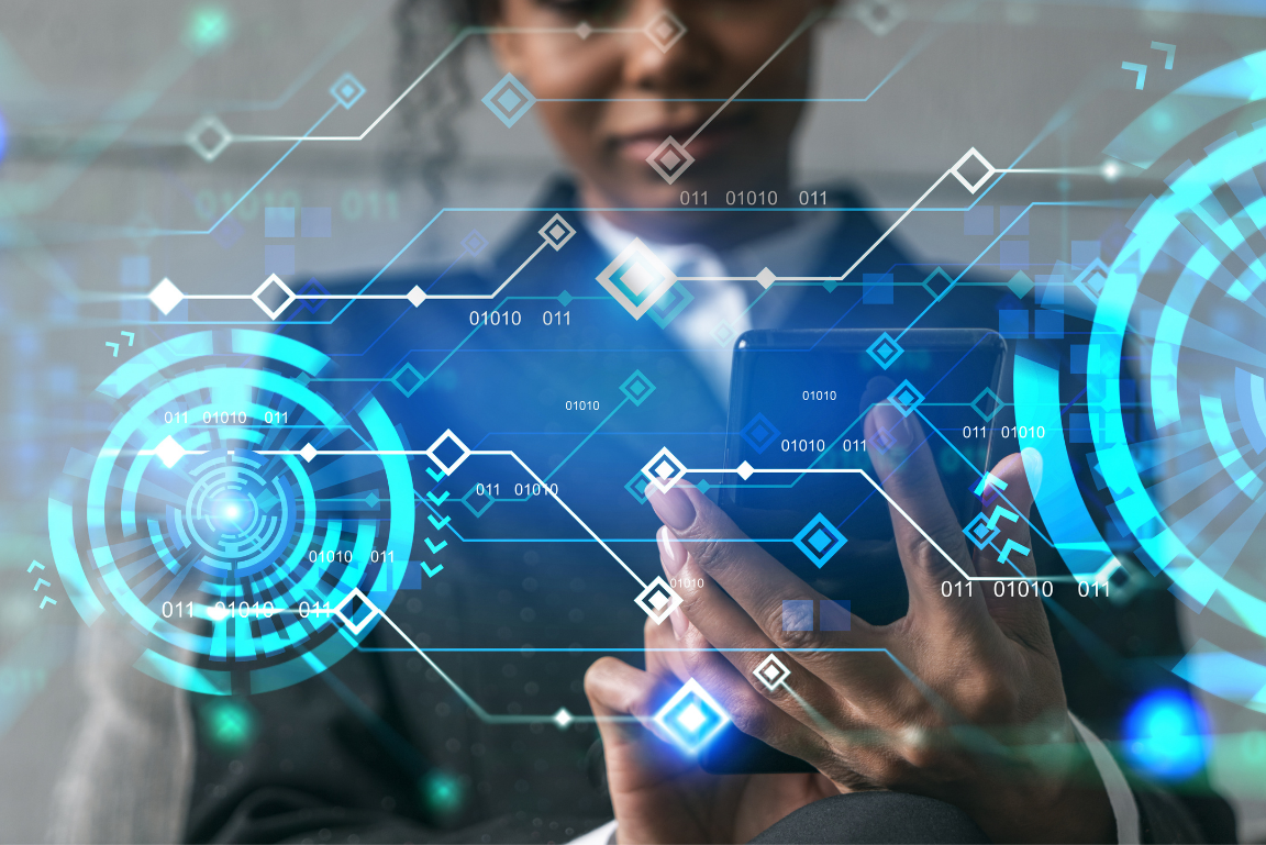 woman looking at data on cell phone and futuristic data hologram