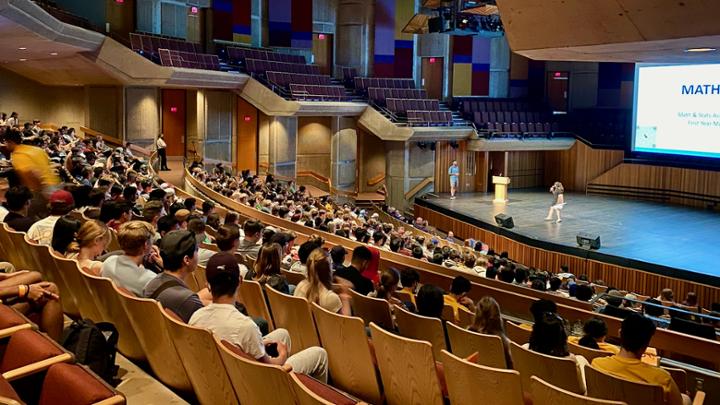 Dean Mina Hoorfar emcees the new student welcome event in the Farquhar Auditorium.