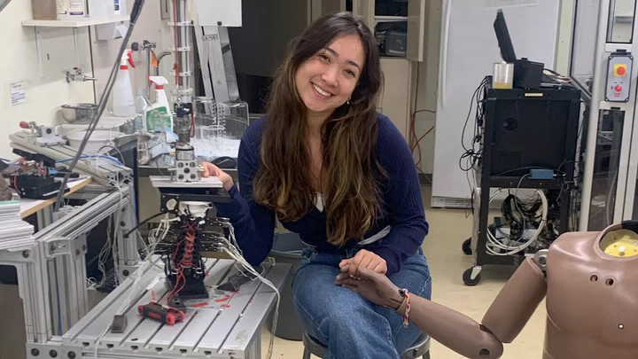 student working on prosthetic hand