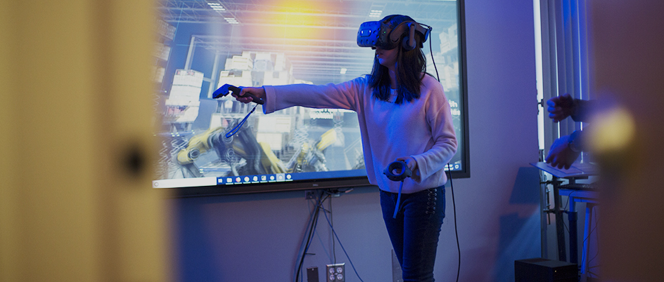 UVic student using a virtual reality set