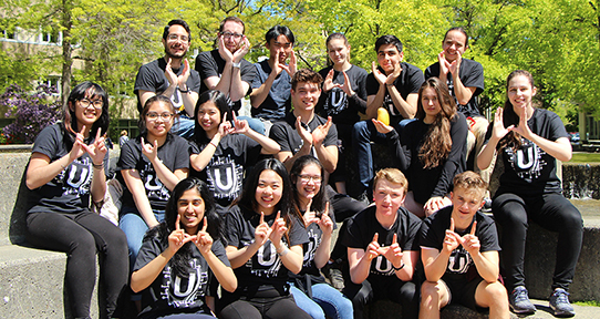 Group of HighTech U participants posing at the UVic fountain