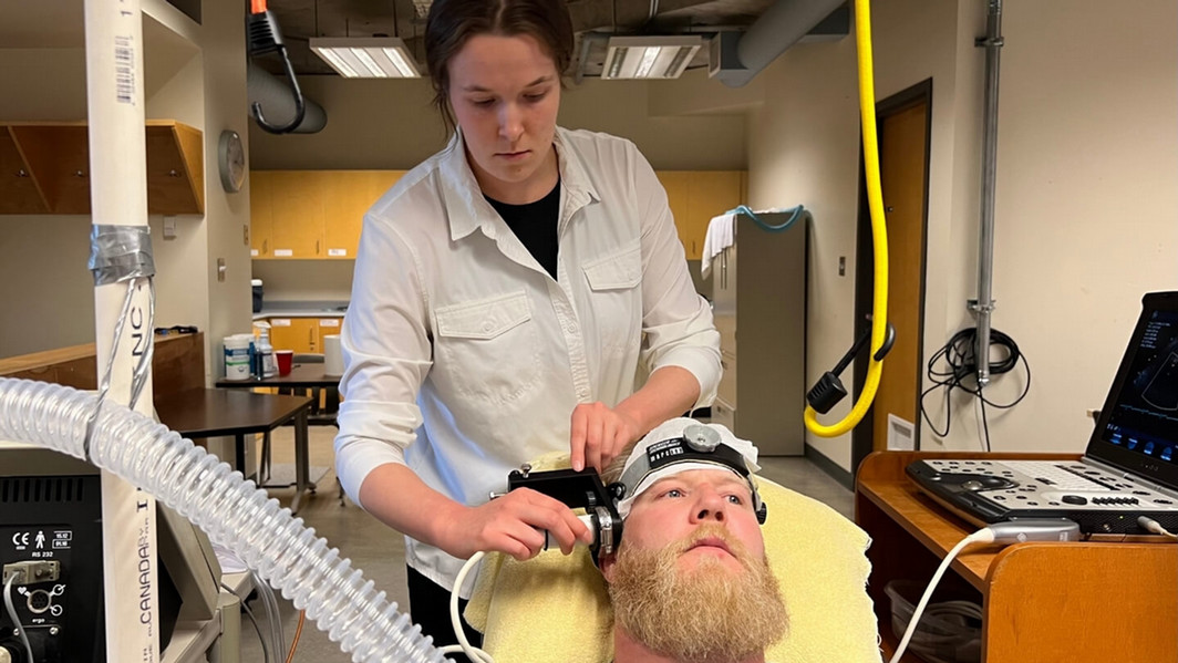 Dr. Kurt Smith and graduate student Tabitha Craig conducting a test in the CHEERS lab.