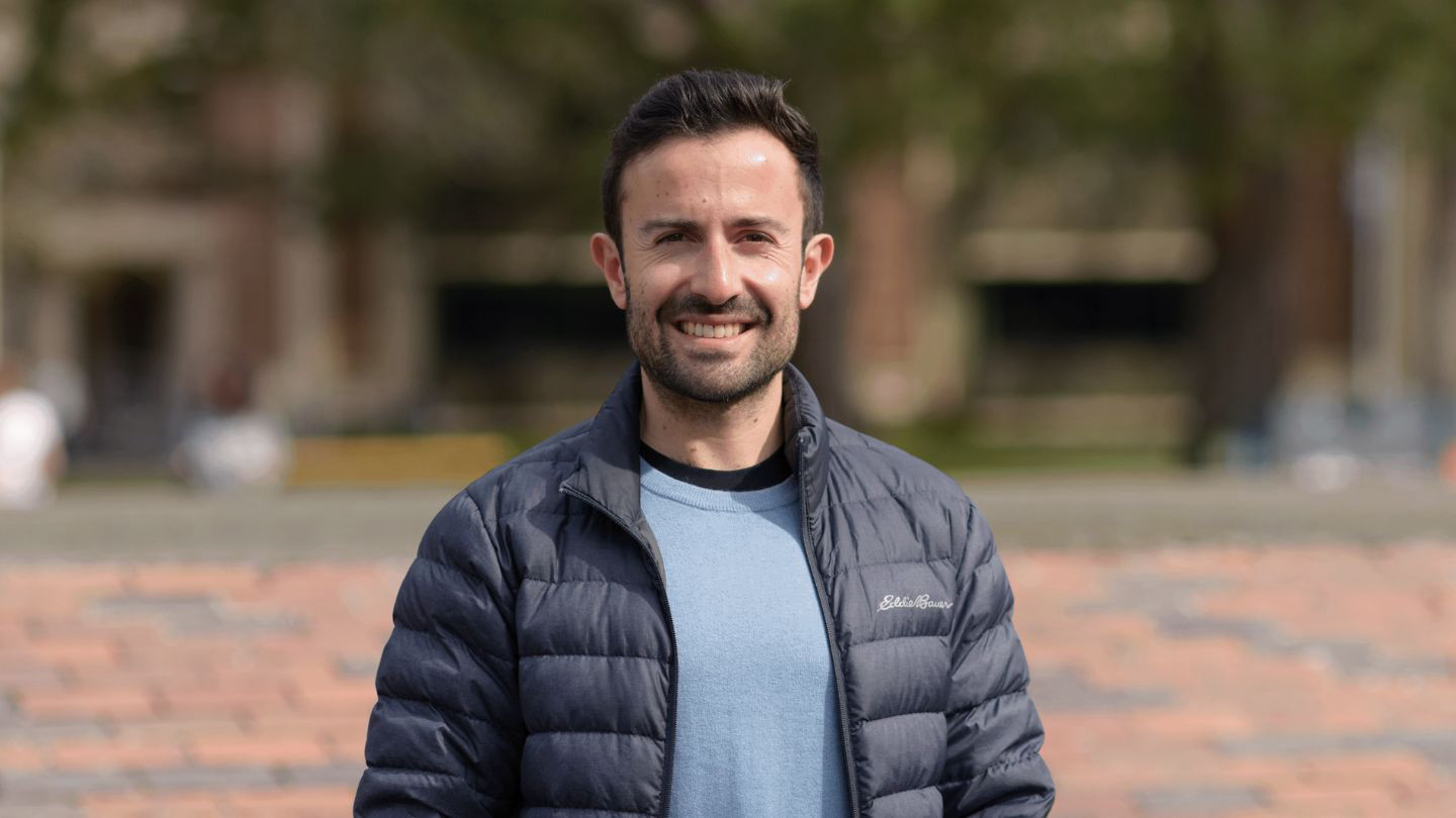 Graduate student Matthew Barbas is pictured outside the MacLaurin Building. 