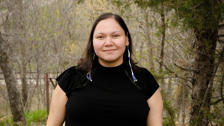PhD student Nacole Walker is pictured outdoors.
