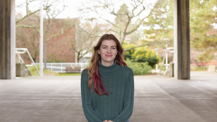 An undergraduate student pictured outside the MacLaurin building.
