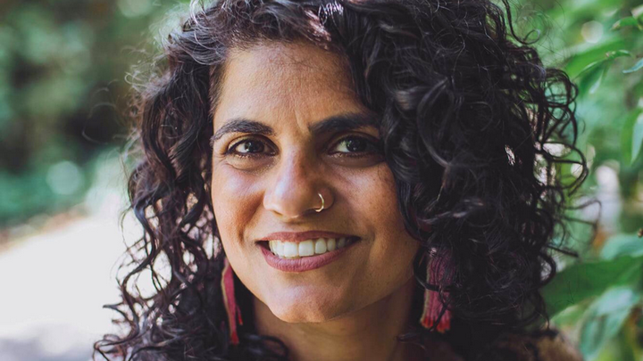 Mandeep Kaur Mucina smiling. 